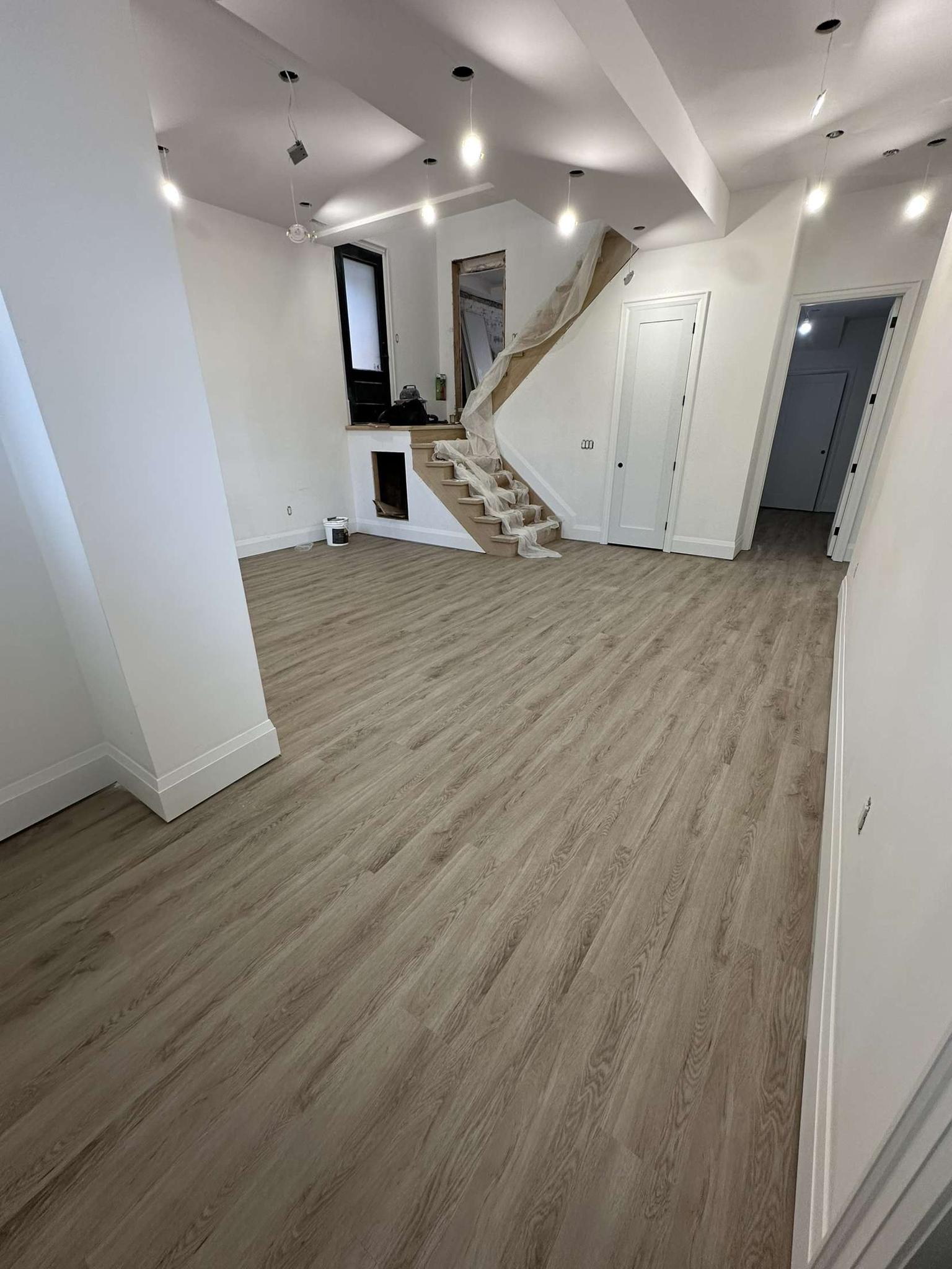 Vinyl plank flooring installation in Toronto basement