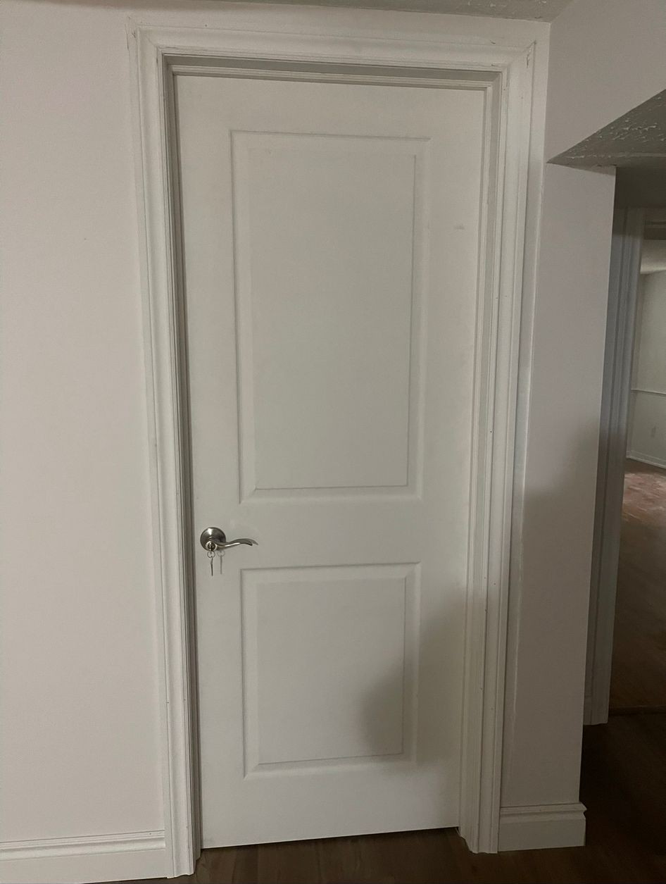 Professional interior door and trim installation in Toronto home showing quality craftsmanship
